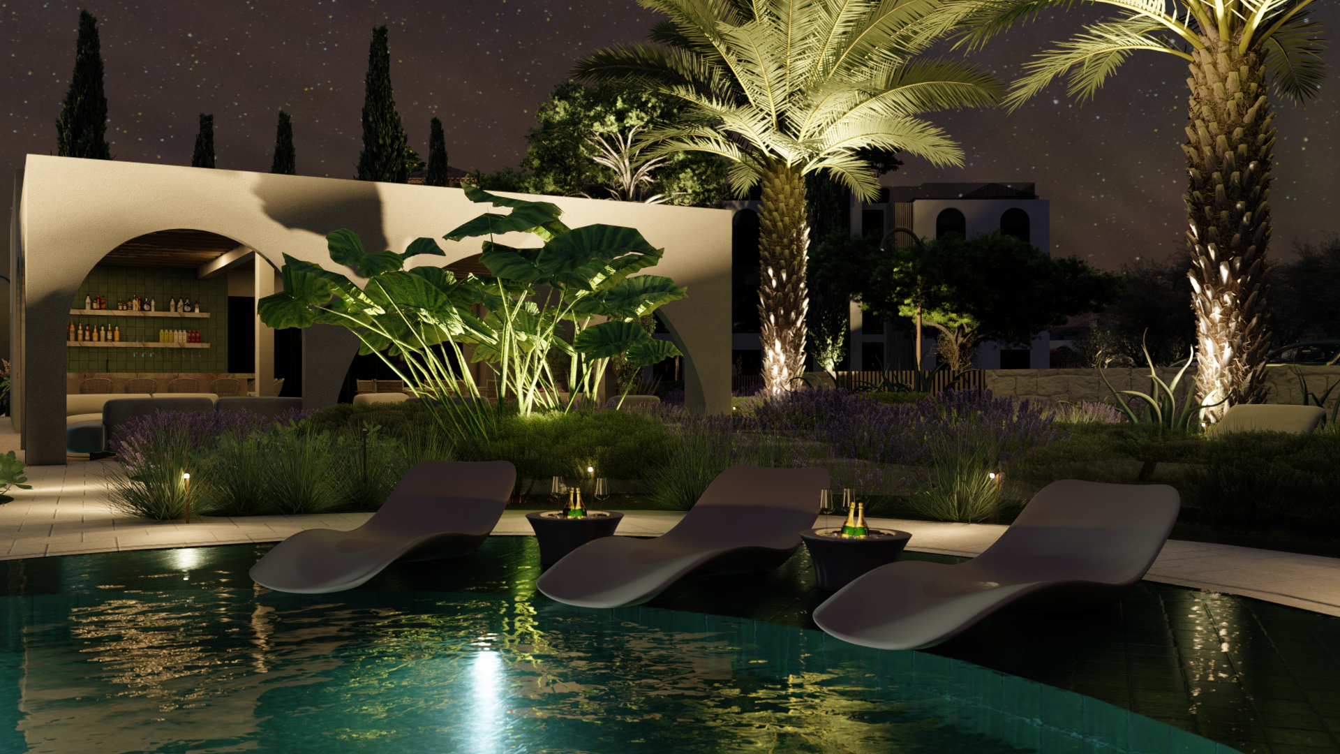 Communal pool and bar within Luna Nova at night, lit palms and cypresses, loungers over the water.